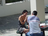 Image of two students talking