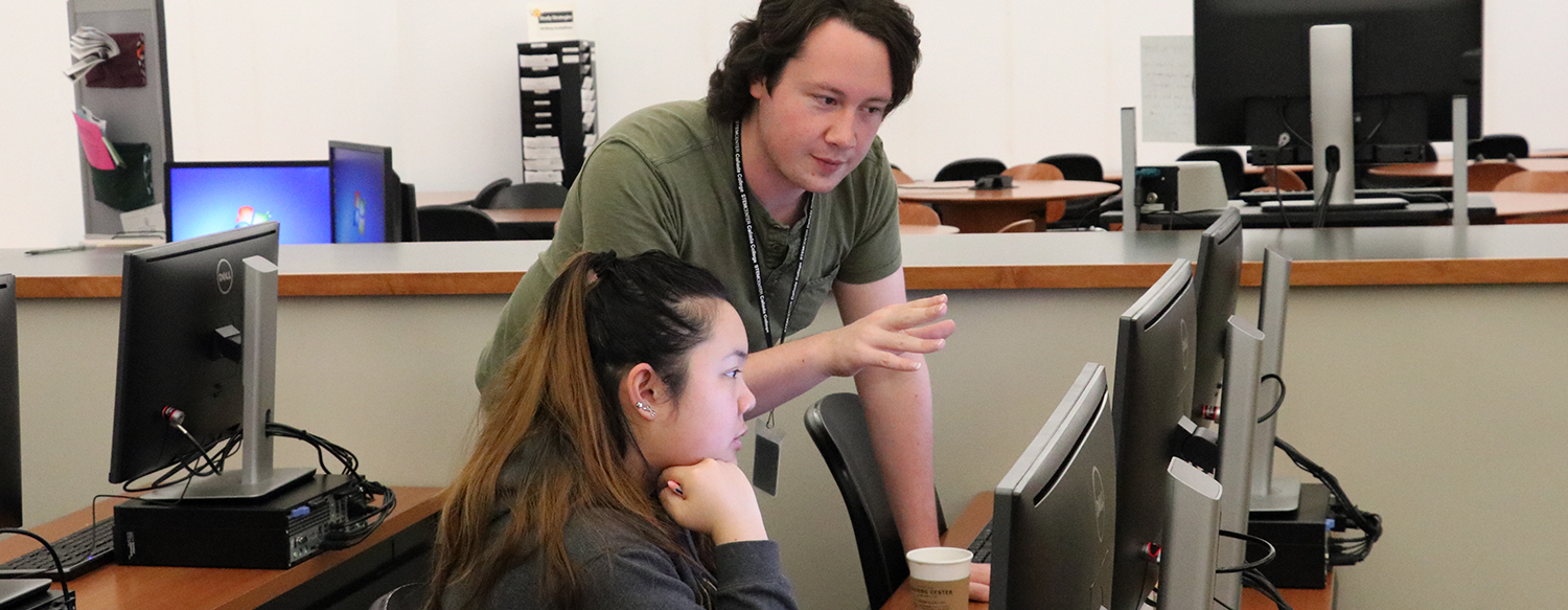 Tutor assisting student using a computer